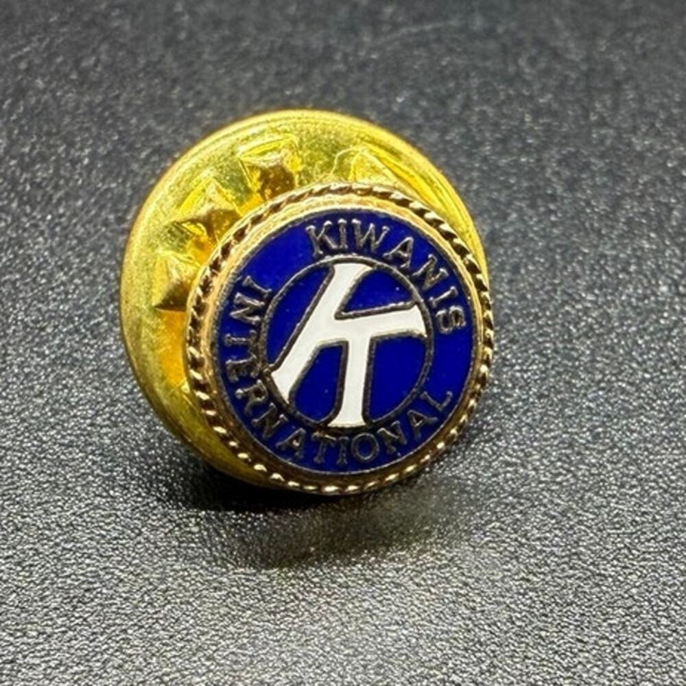 Vintage Kiwanis International blue enamel and gold-toned lapel pin